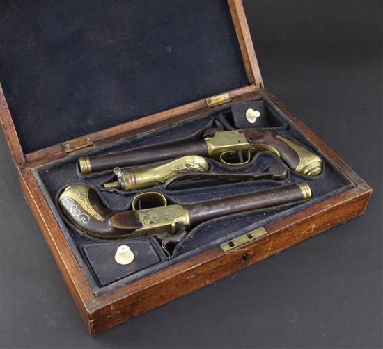 A cased pair of early 19th century brass mounted boxlock pistols, 10in., cased with brass powder horn